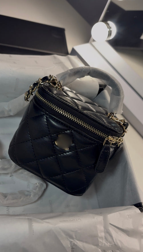 C. Mini Quilted Vanity Bag