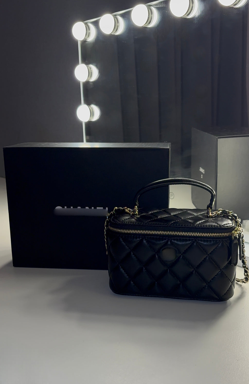 C. Quilted Vanity Bag – Black